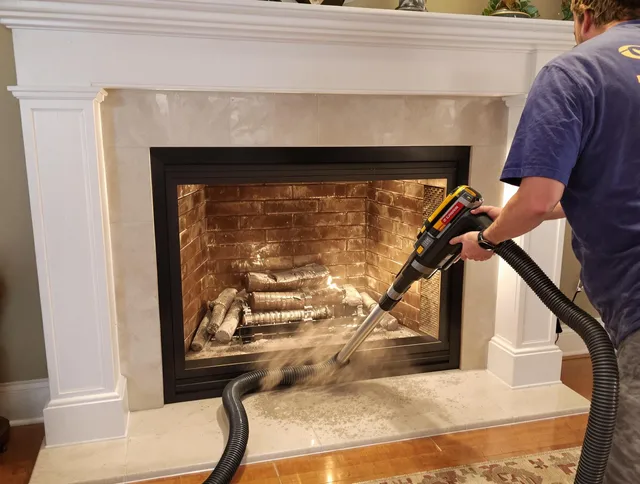 Fireplace cleaning performed by Darien Chimney Sweep in Darien, CT